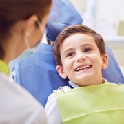 Happy child smiling at dentist